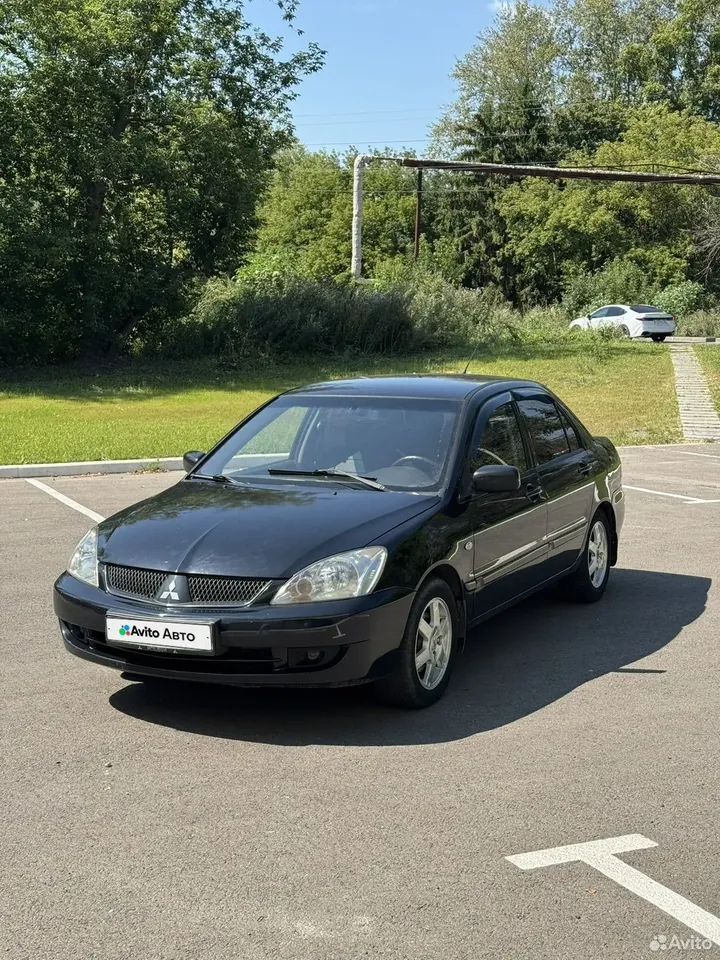 Mitsubishi Lancer IX — вид спереди и слева