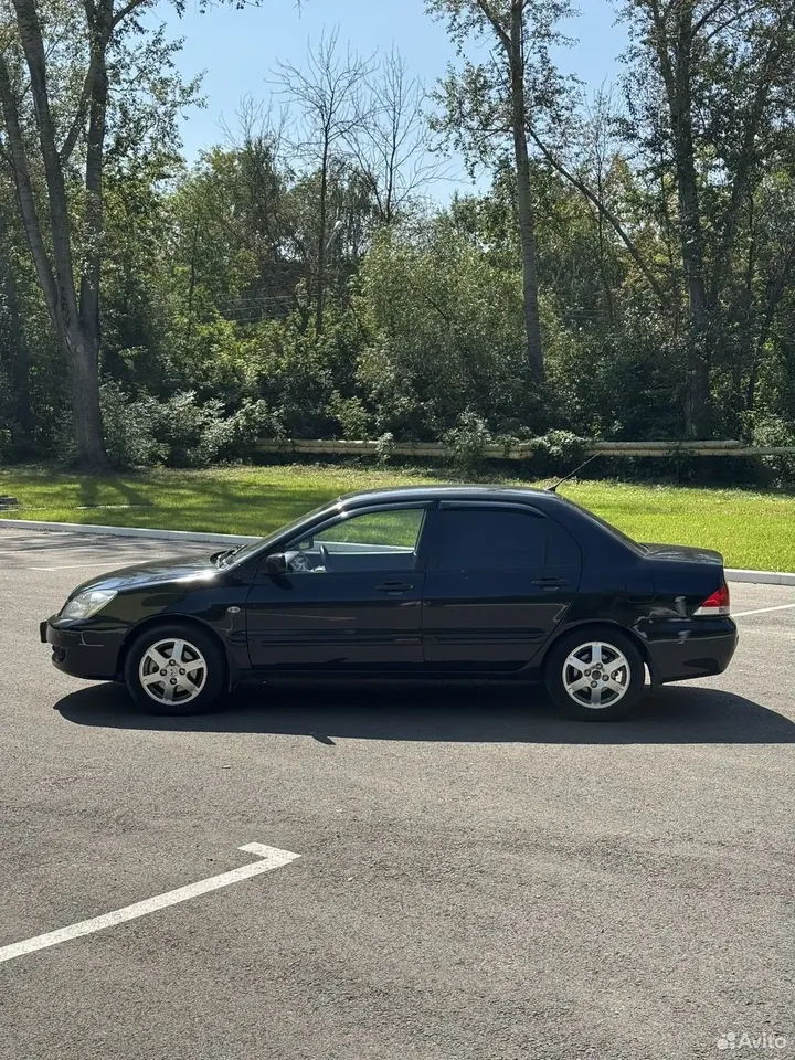 Mitsubishi Lancer IX — левый бок
