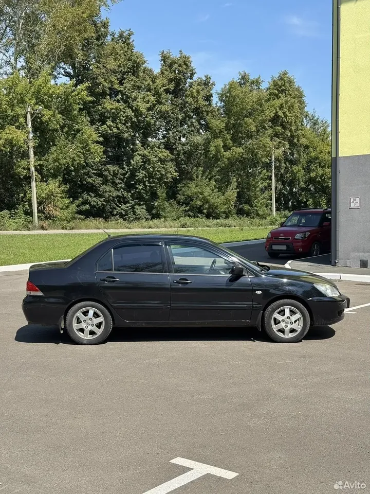 Mitsubishi Lancer IX — правый бок